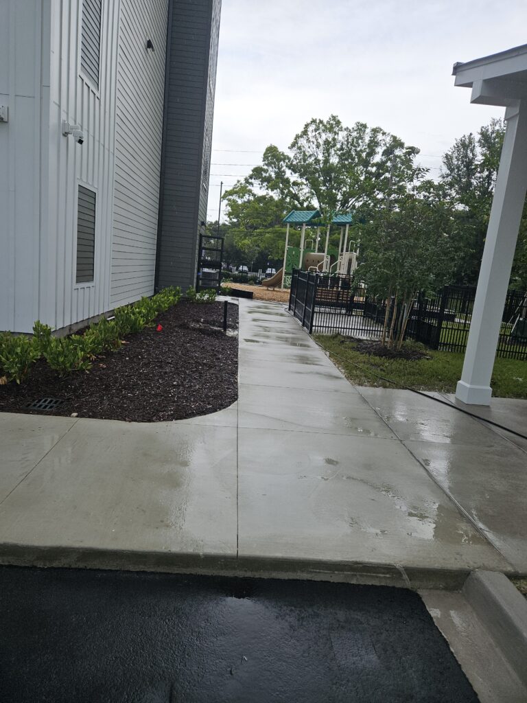 Commercial apartment complex sidewalk and playground area pressure washed in St. Augustine, Fl.